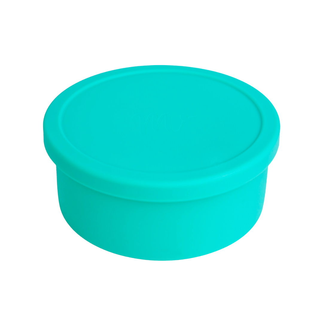 Sea foam green round silicone bento bowl with Mermaid Straw logo on the lid