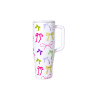 White mug with colorful bow pattern on a white background