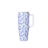 White mug with blue mermaid pattern on a white background