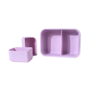 Set of purple silicone containers on a white background