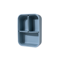 Blue divided silicone bento box on a white background