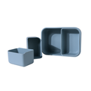 Blue divided silicone bento box on a white background