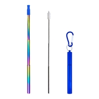 Telescopic rainbow-colored straw with a pink silicone tip and blue case with carabiner on a white background